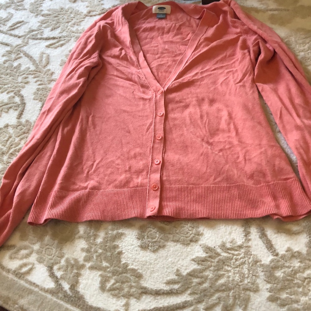 Peach button-down cardigan. V-neck.